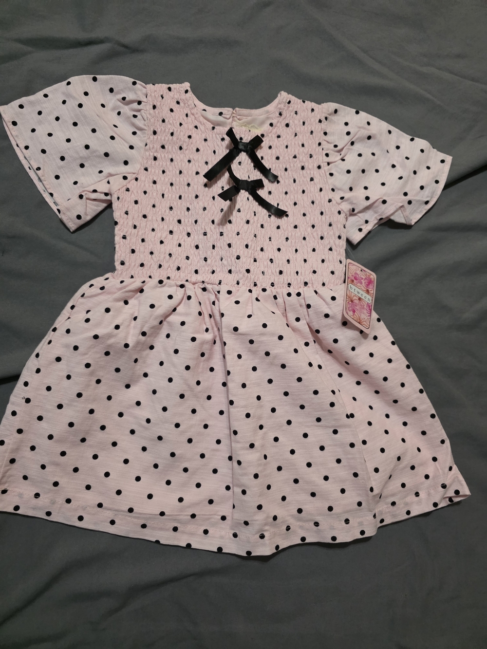 Pink Polka Dot Smocked Short Sleeve Dress with Black Bows - Kids